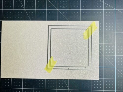 Making a "frame" from glitter cardstock.