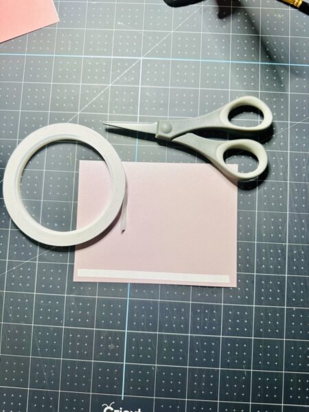 How to use double-sided tape for a card panel.